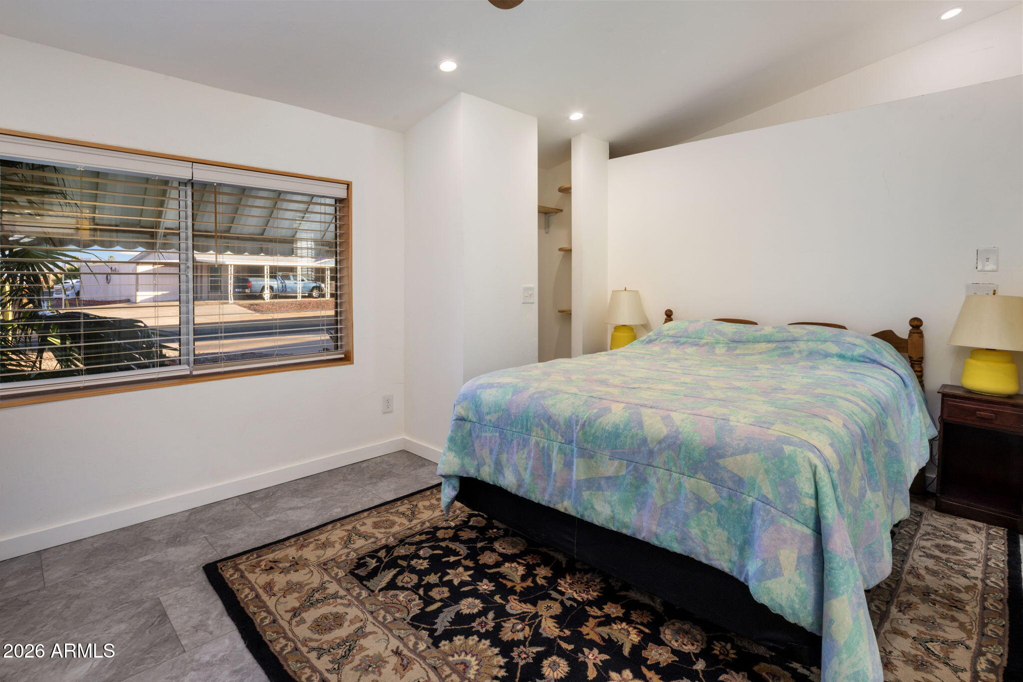 2311 North Gayridge Road Mesa, AZ 85215 - Photo 13 of 31 a bedroom with a bed and glass window