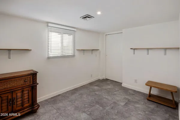 a room with furniture and a window