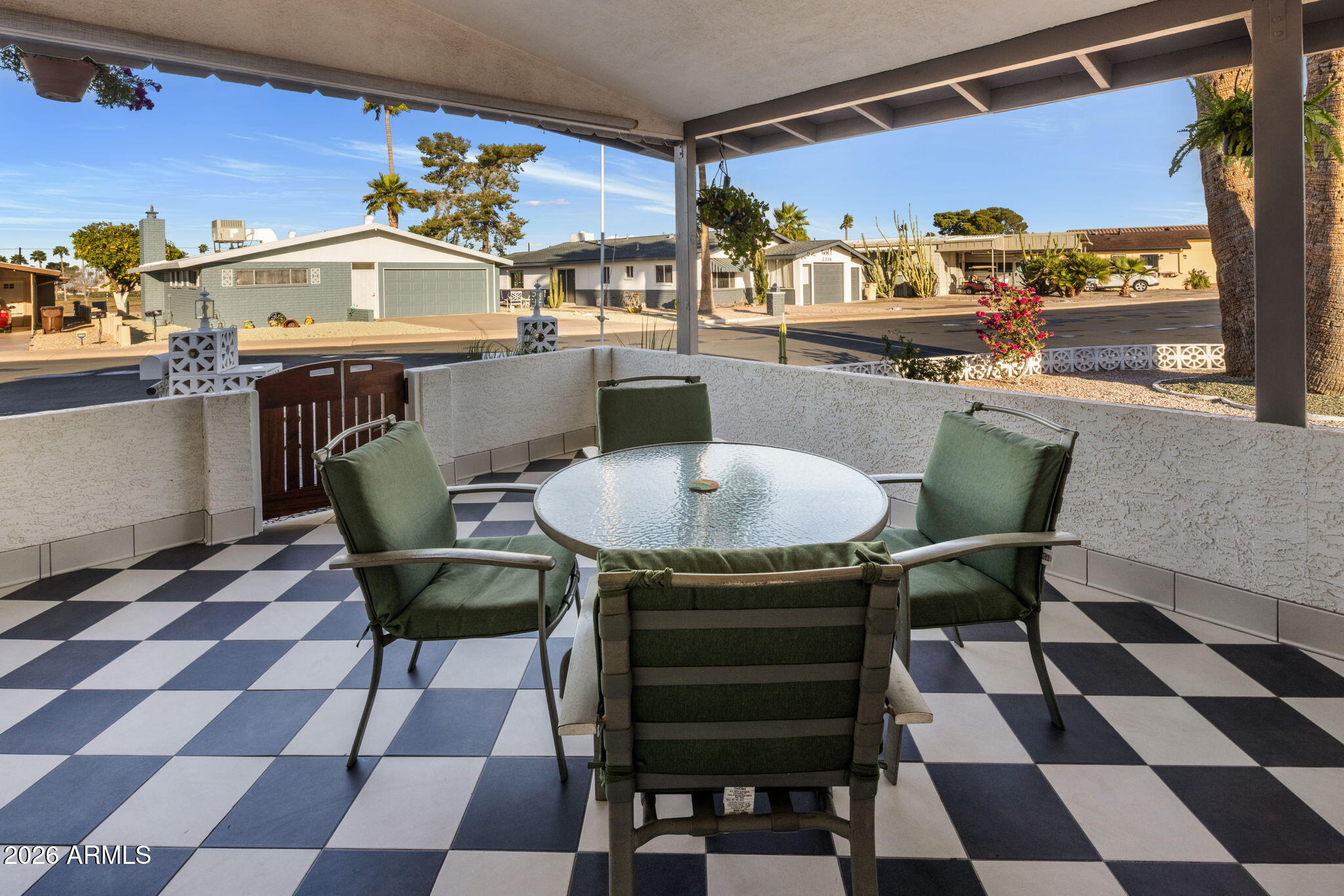 2311 North Gayridge Road Mesa, AZ 85215 - Photo 20 of 31 a dining area with a table and chairs in it