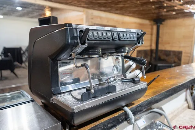 a view of a house with swimming pool and sitting area