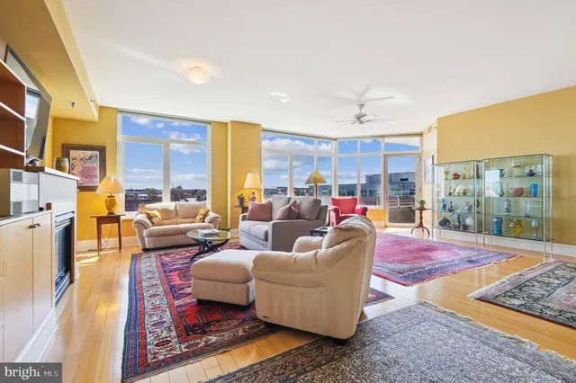 a living room with furniture and a table