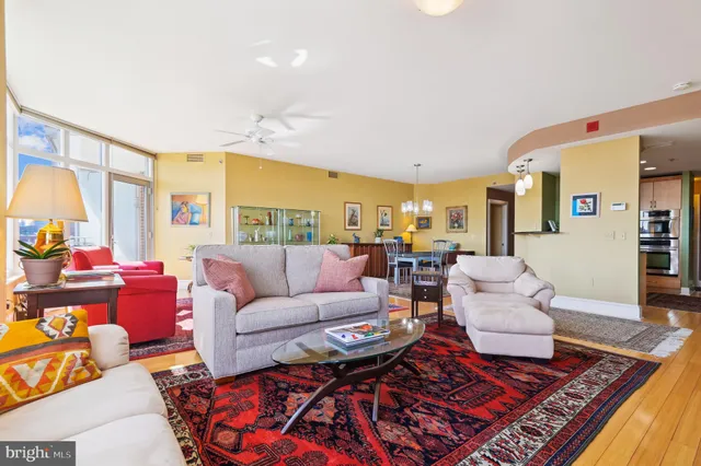 a living room with furniture and a table
