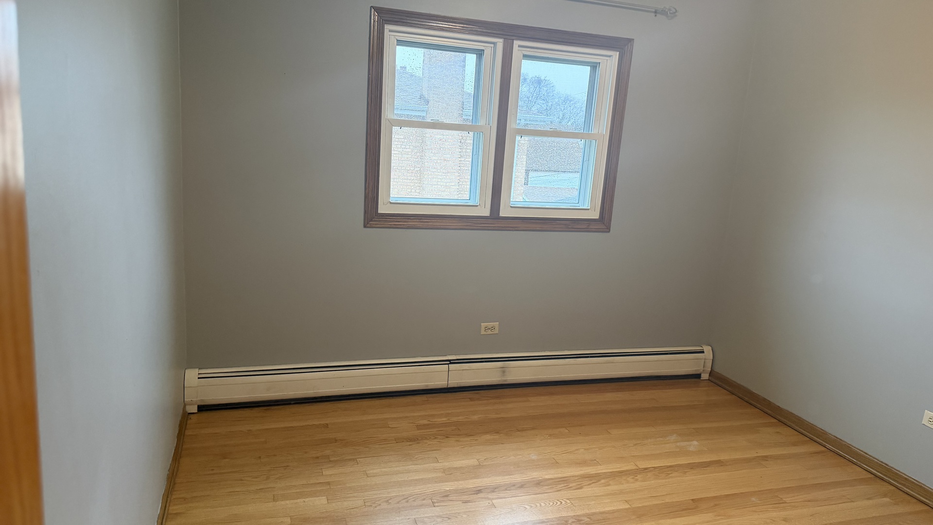5124 South Kostner Avenue, Unit 2 Chicago, IL 60632 - Photo 6 of 12 a view of a room with window