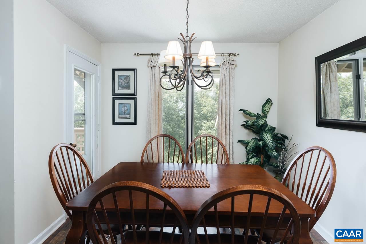2045 Stone Ridge Roseland, VA 22967 - Photo 8 of 17 a view of a dining room with furniture window and wooden floor