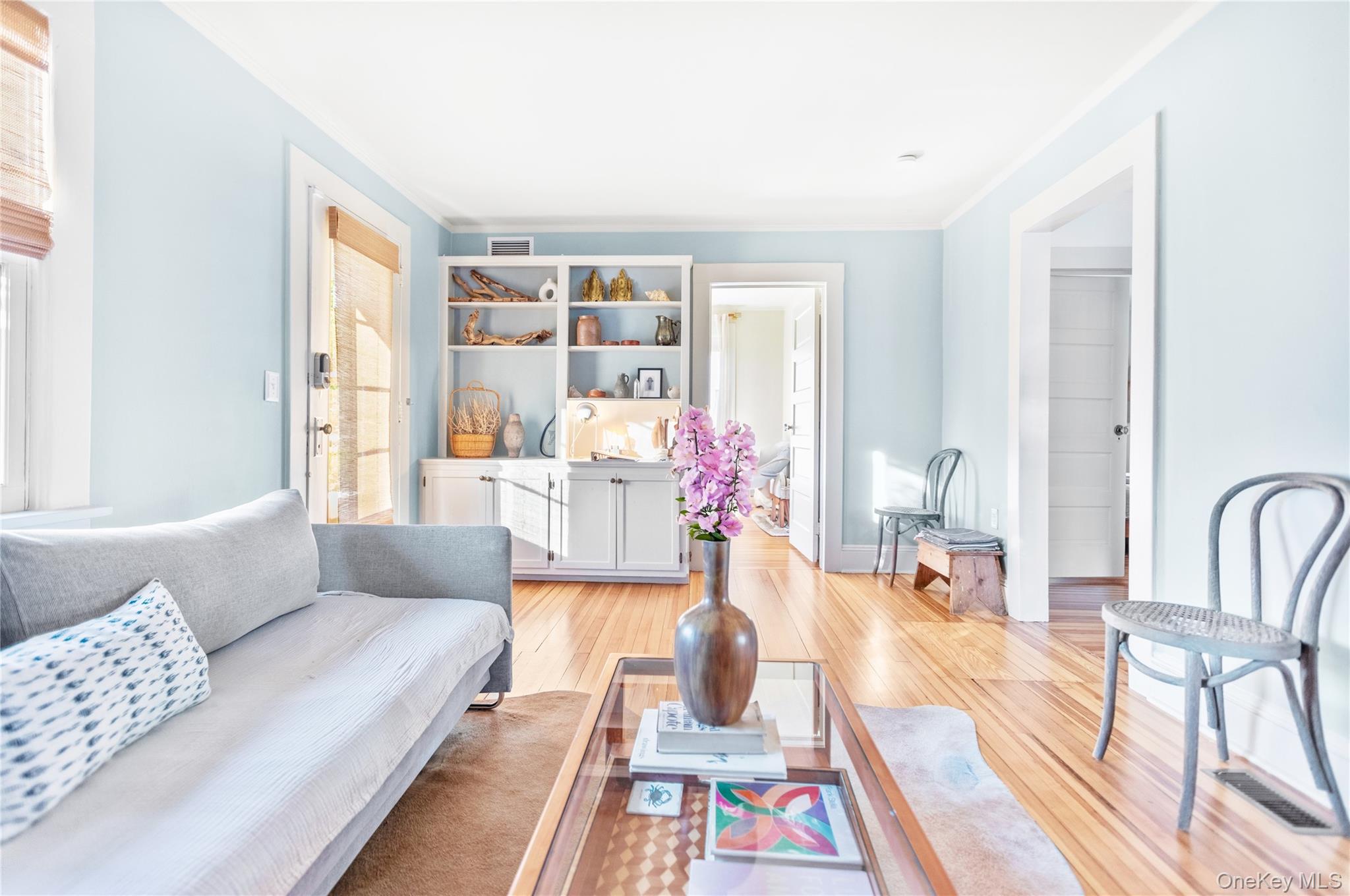 47 Station Road Bellport, NY 11713 - Photo 3 of 13 a living room with furniture and next to a window