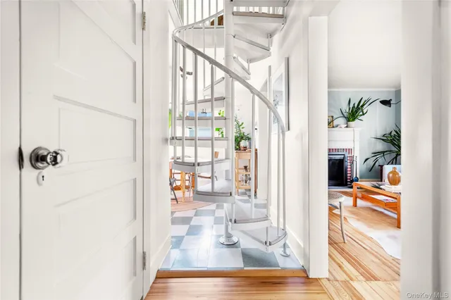 a view of a living room and hardwood floor