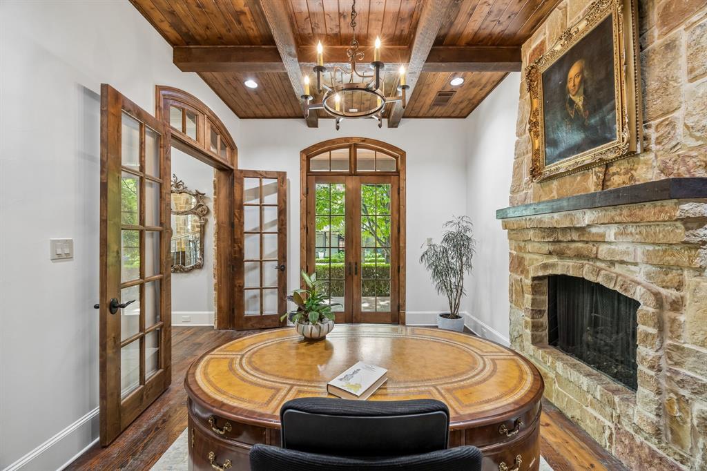 8000 Trading Post Drive McKinney, TX 75070 - Photo 25 of 37 a room with fireplace furniture and a chandelier