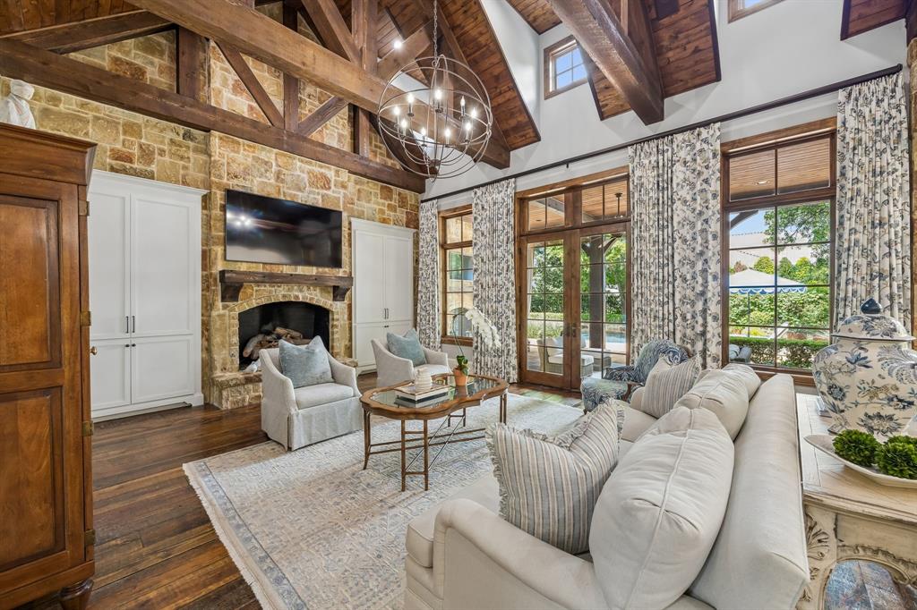 8000 Trading Post Drive McKinney, TX 75070 - Photo 8 of 37 a living room with furniture fireplace and a large window