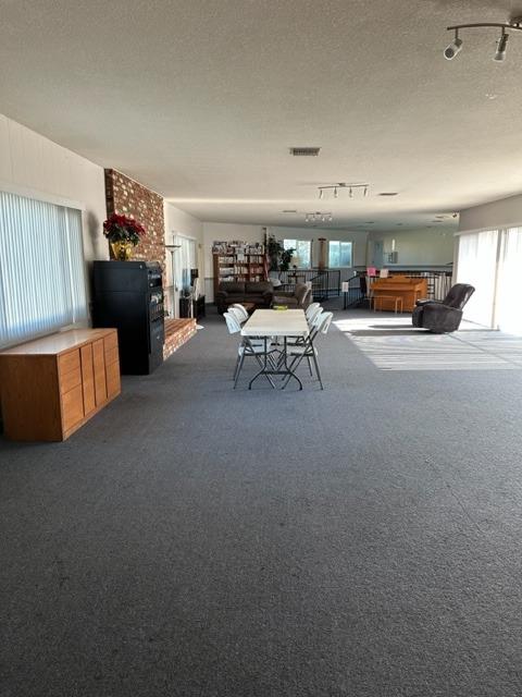 1272 Villa Avenue, Unit 1 Clovis, CA 93612 - Photo 16 of 18 a living room with furniture and a couch