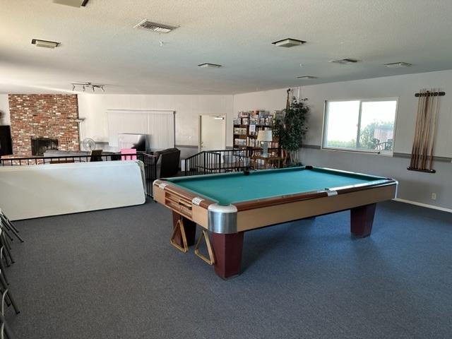 1272 Villa Avenue, Unit 1 Clovis, CA 93612 - Photo 17 of 18 a living room with furniture pool table and windows