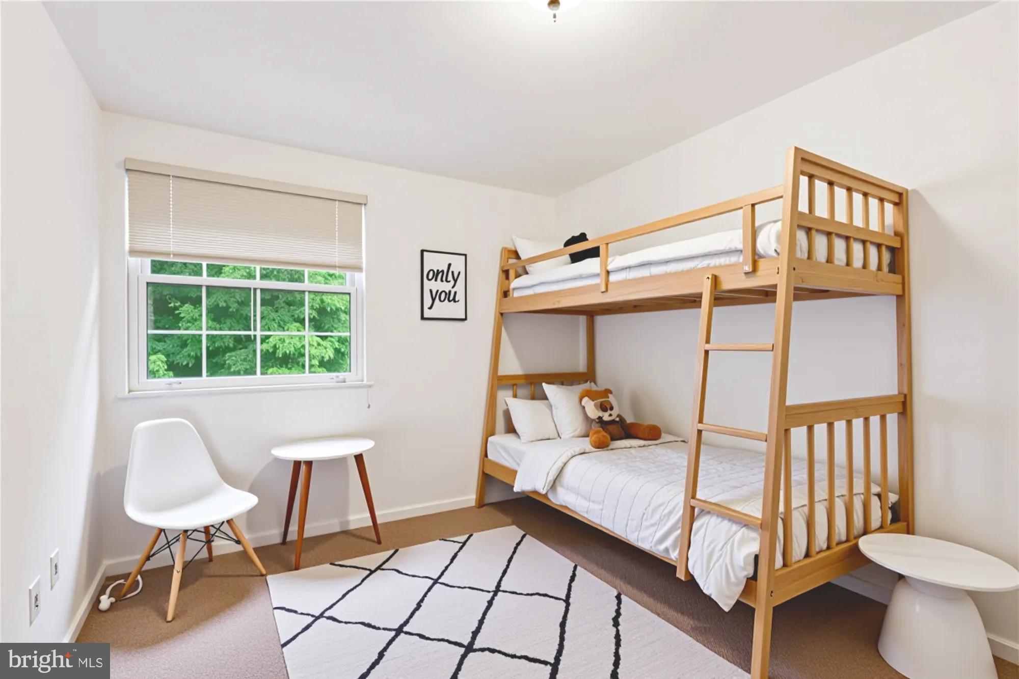 10921 Harpers Square Court Reston, VA 20191 - Photo 12 of 33 a bedroom with a bed and a chair