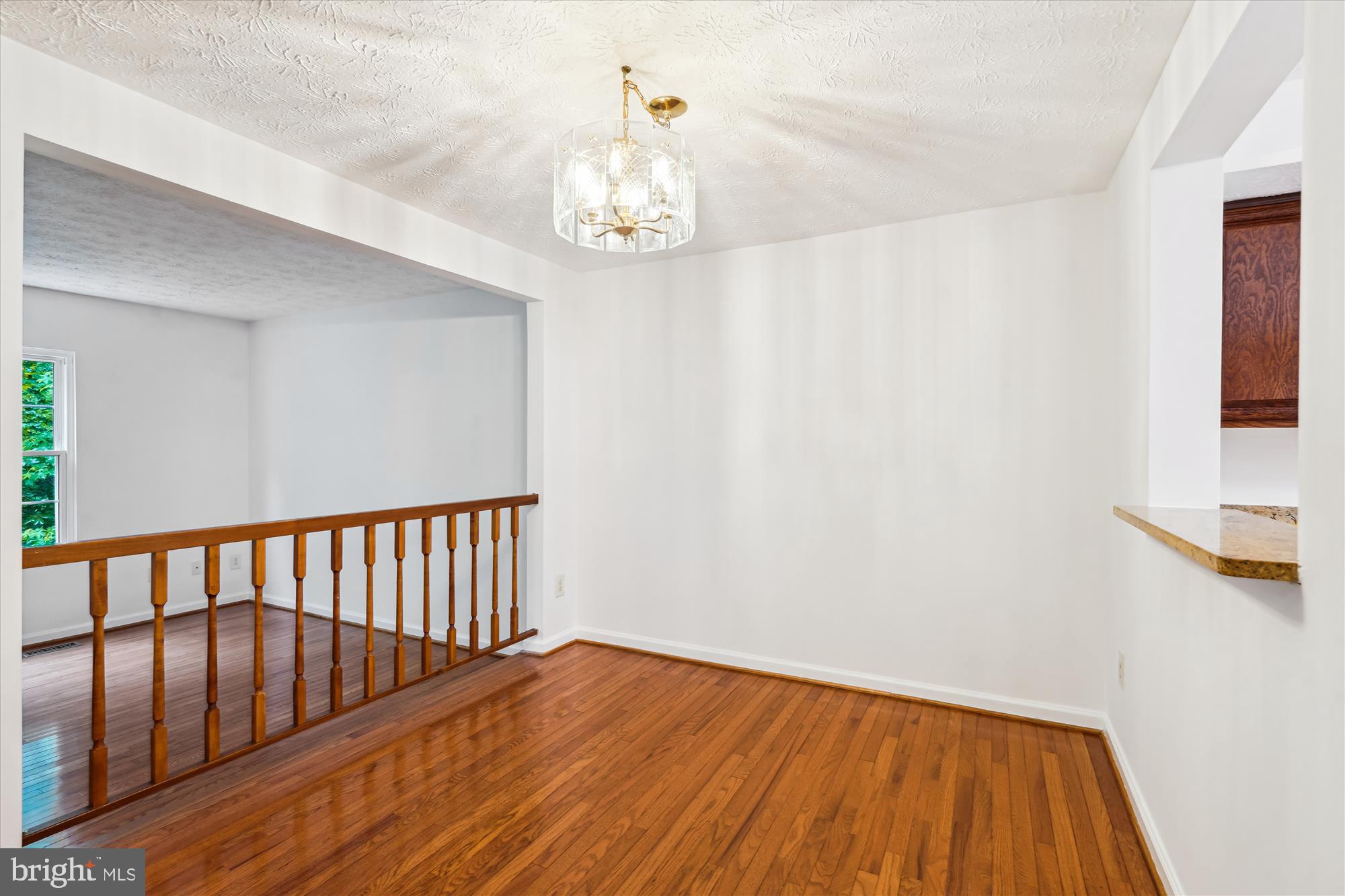 10921 Harpers Square Court Reston, VA 20191 - Photo 22 of 33 a view of hallway with wooden floor