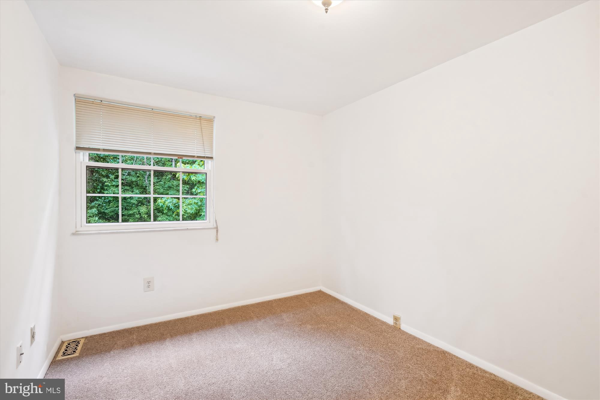 10921 Harpers Square Court Reston, VA 20191 - Photo 30 of 33 a view of an empty room with a window