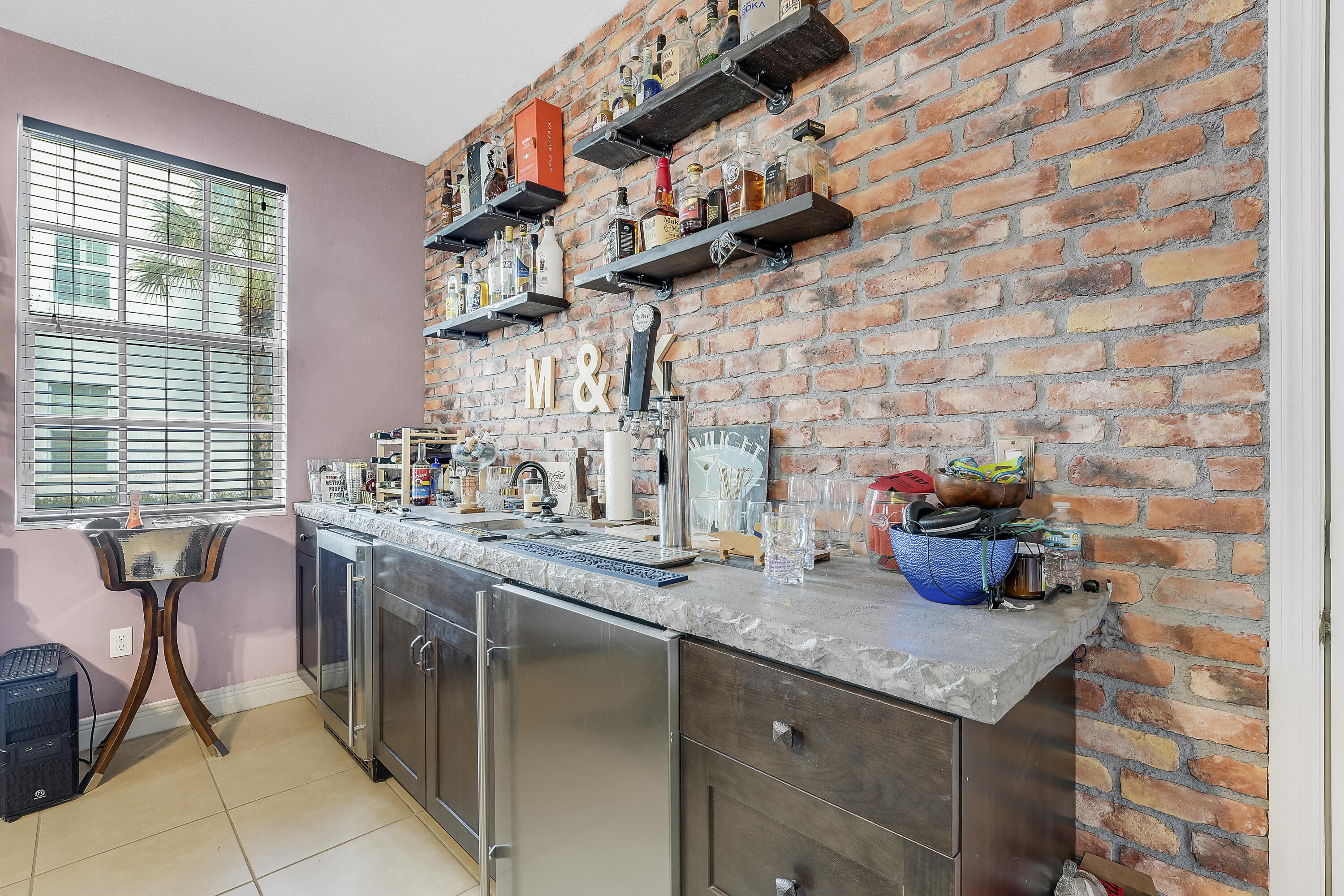 2900 Southwest 119th Way Miramar, FL 33025 - Photo 19 of 37 a kitchen with stainless steel appliances granite countertop a sink stove and cabinets