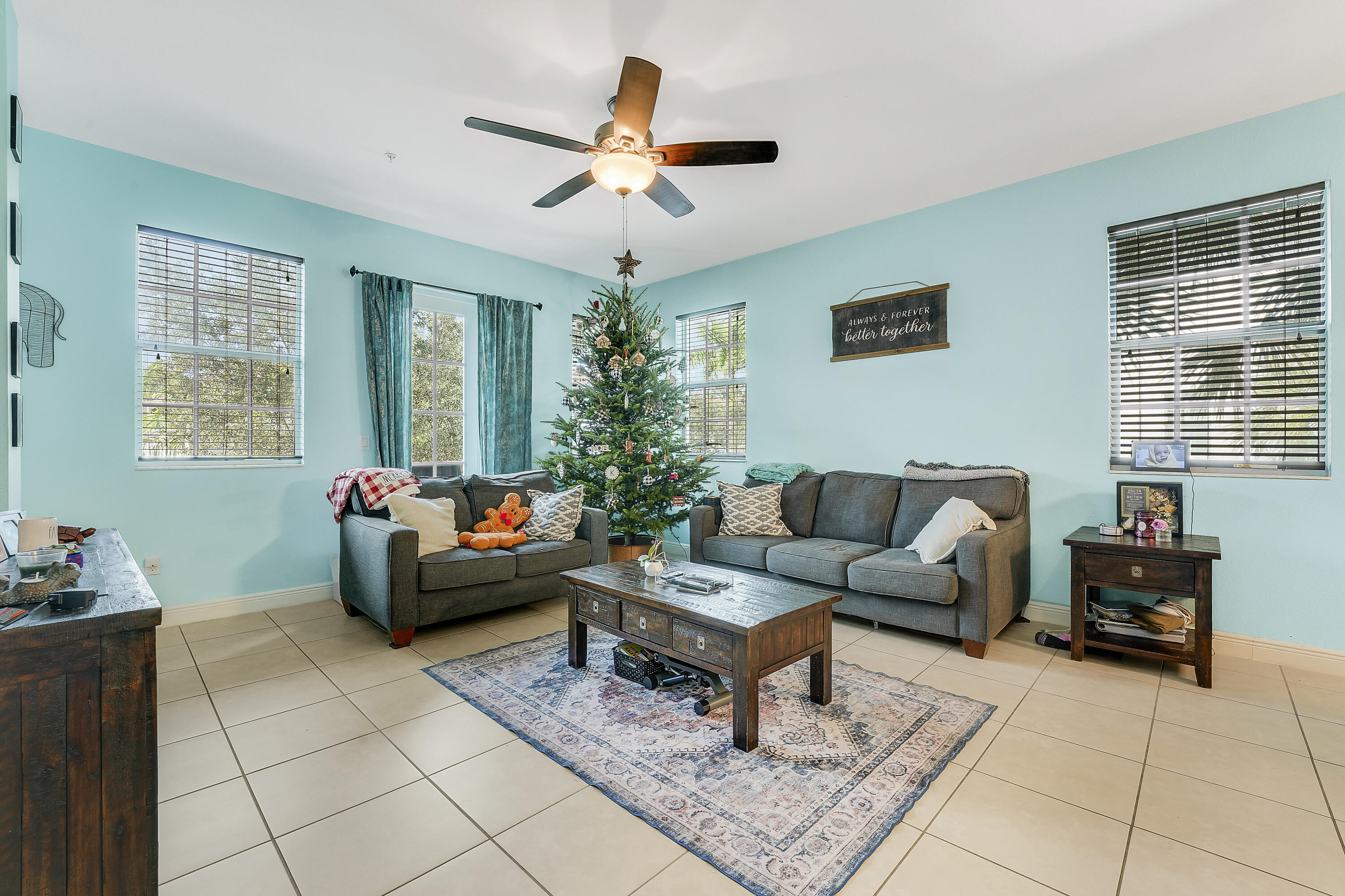 2900 Southwest 119th Way Miramar, FL 33025 - Photo 21 of 37 a living room with furniture and a window