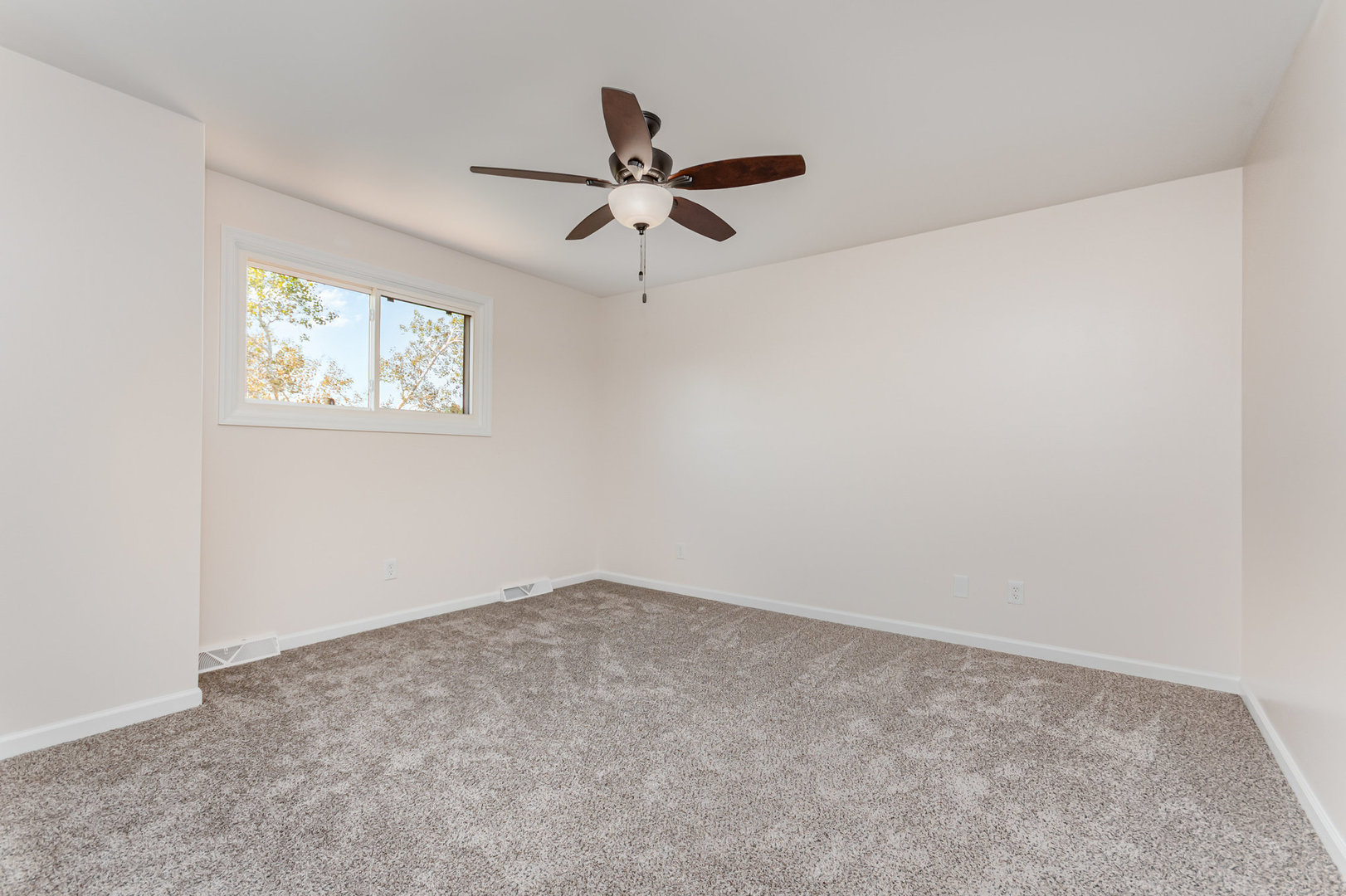 2380 Chestnut Lane Morris, IL 60450 - Photo 16 of 25 an empty room with a window and a fan