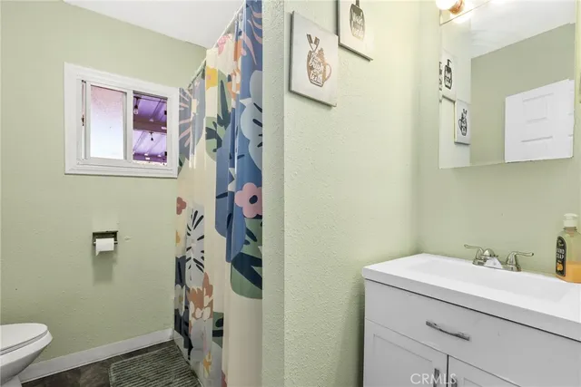 a bathroom with a sink and a toilet