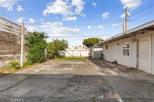 a view of a backyard of a house