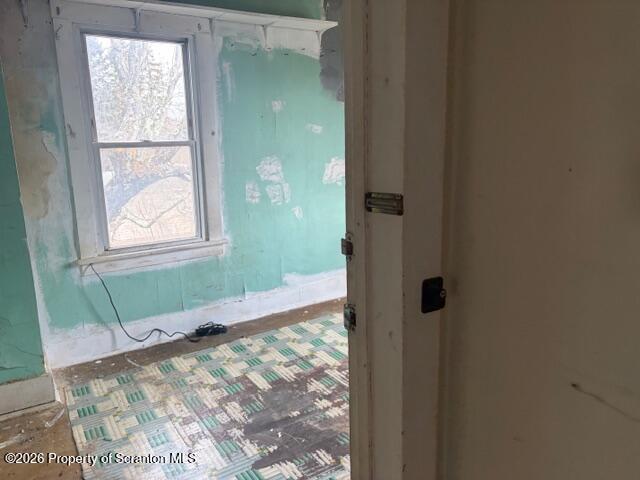 728 Main Street Vandling, PA 18421 - Photo 12 of 17 a bathroom with a window and a shower