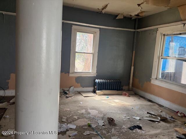 728 Main Street Vandling, PA 18421 - Photo 8 of 17 a bedroom with a bed and window