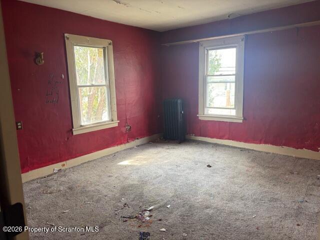 728 Main Street Vandling, PA 18421 - Photo 9 of 17 an empty room with windows