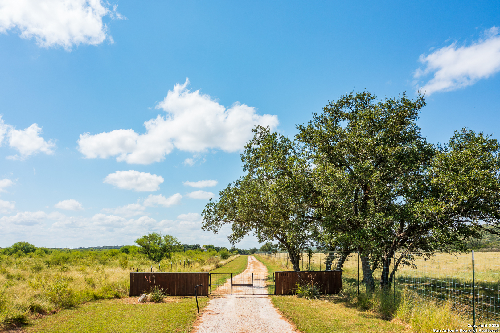 13831 Highway 127 Sabinal, TX 78881 - Photo 37 of 55 a view of swimming pool with seating space