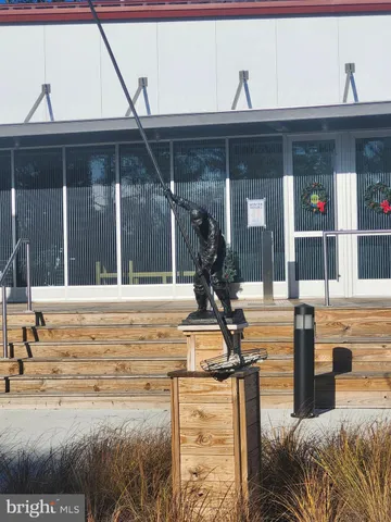 a view of a living room and kitchen
