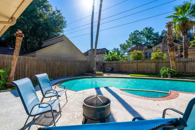 a view of an outdoor sitting area with furniture