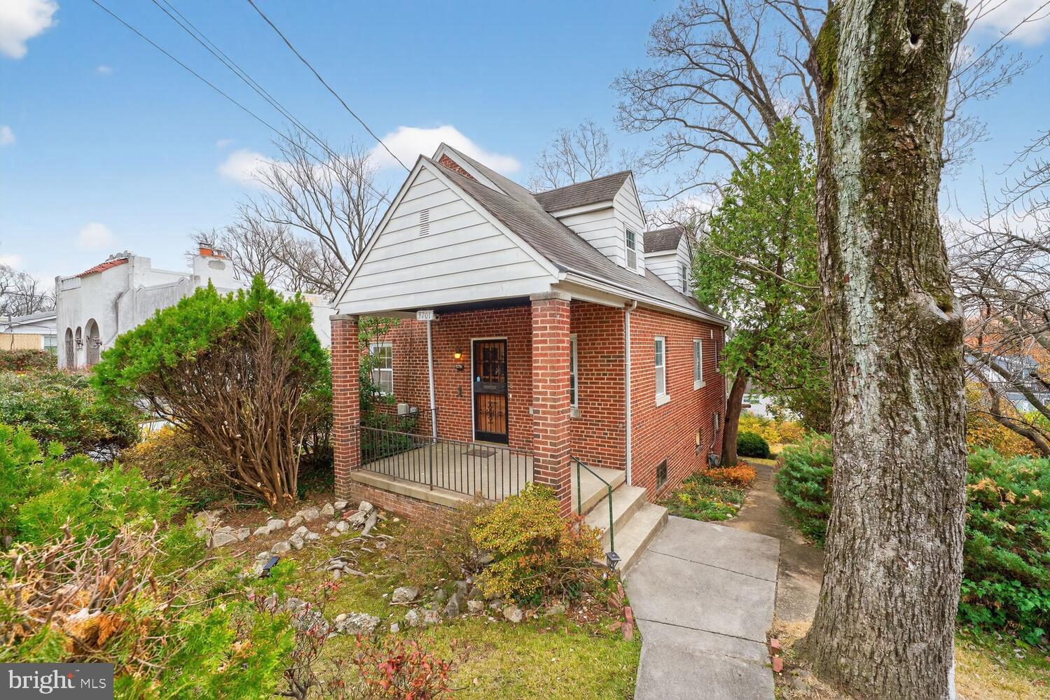 3701 Camden Street Southeast Washington, DC 20020 - Photo 1 of 33 a view of a house with a yard and plants