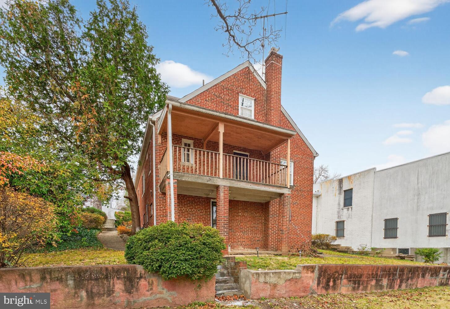 3701 Camden Street Southeast Washington, DC 20020 - Photo 27 of 33 front view of a house with a yard