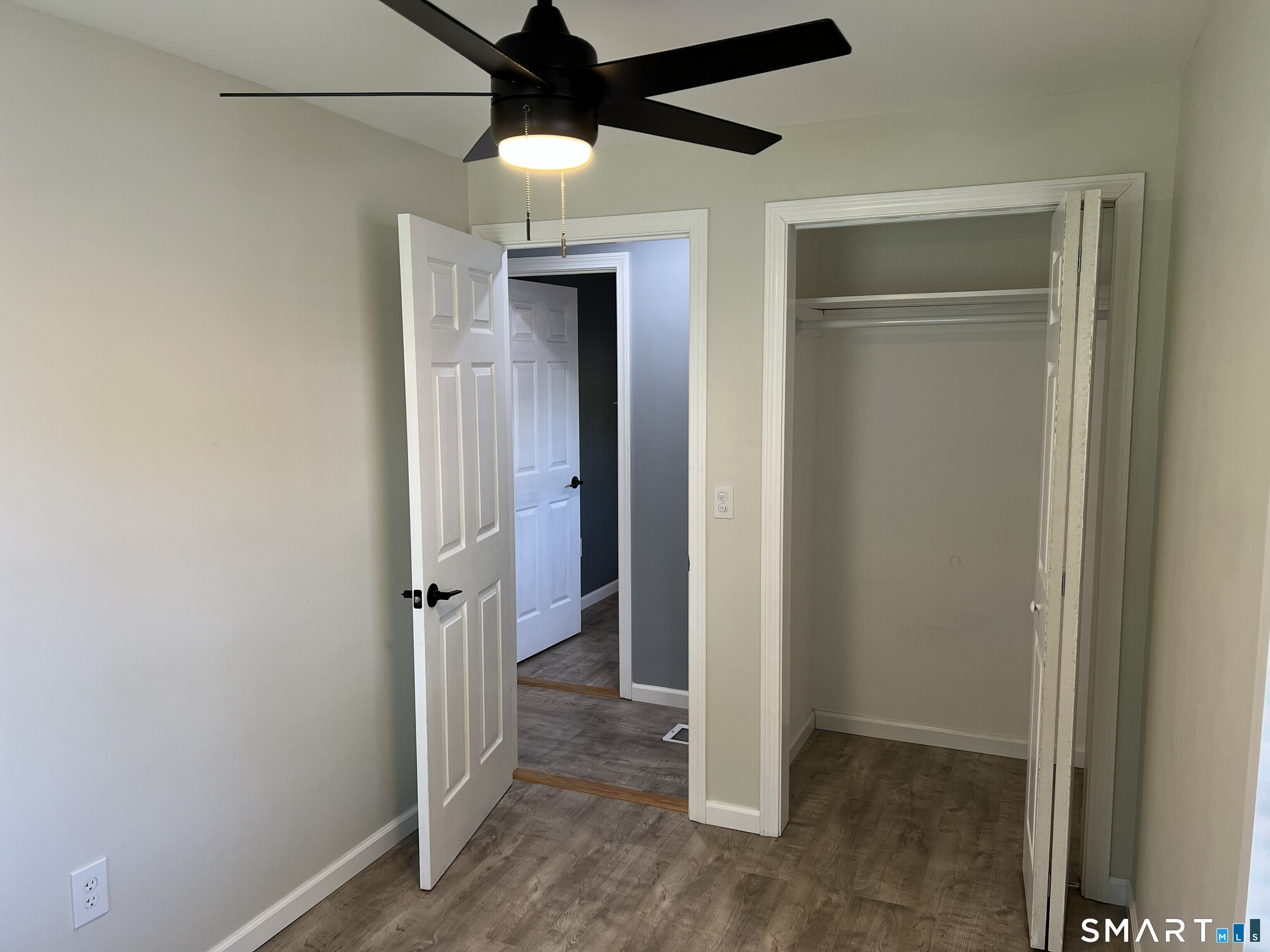 82 Bingham Street Bristol, CT 06010 - Photo 25 of 40 a view of hallway with wooden floor