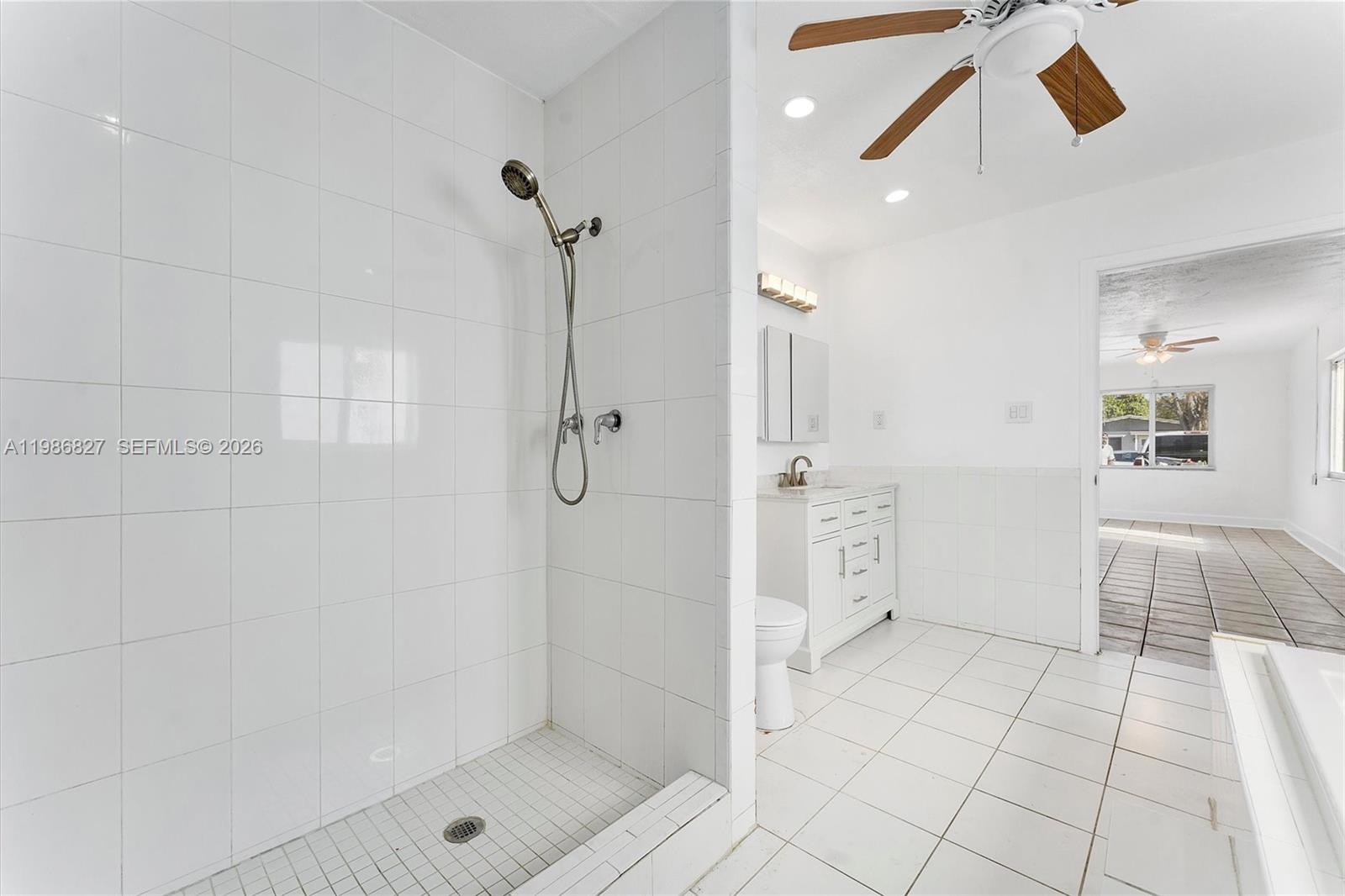 550 Northwest 17th Street Pompano Beach, FL 33060 - Photo 22 of 31 a bathroom with a shower