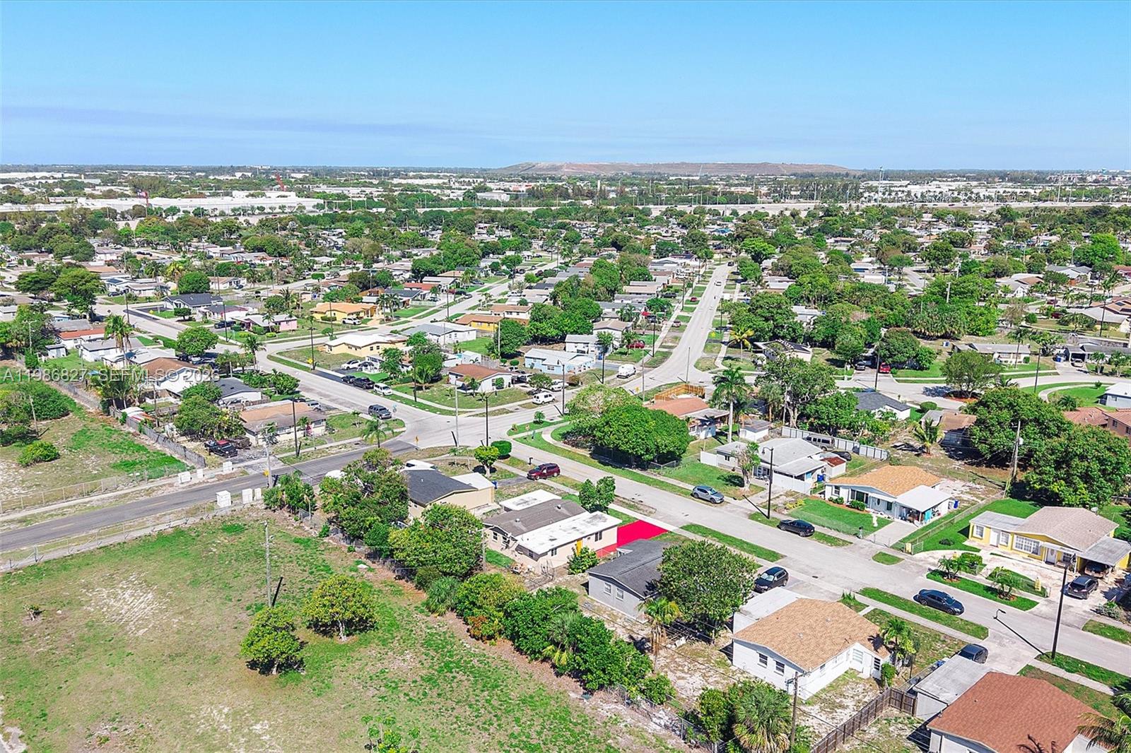 550 Northwest 17th Street Pompano Beach, FL 33060 - Photo 30 of 31 an aerial view of residential houses with outdoor space and trees