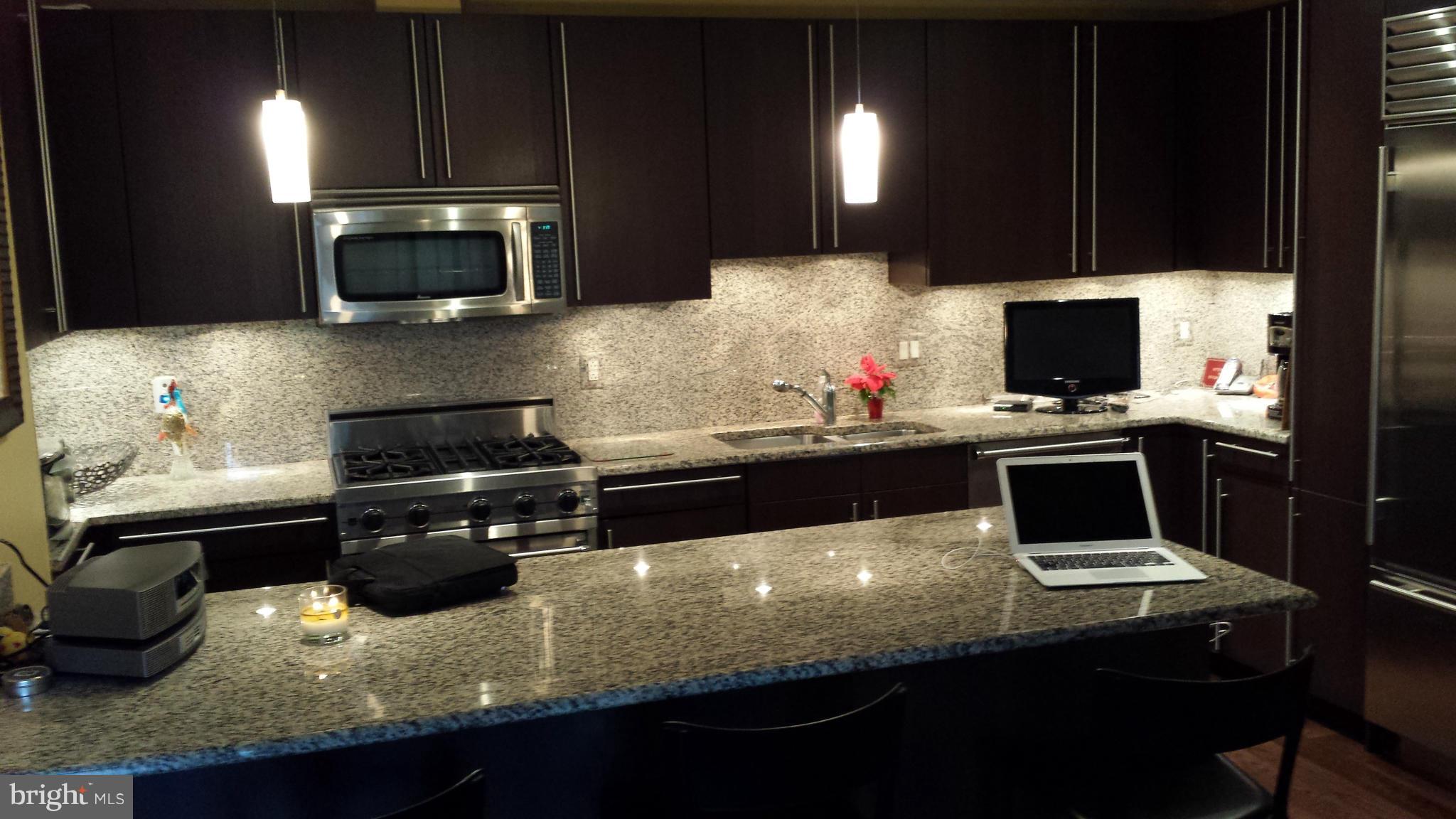 2425 L Street Northwest, Unit 211 Washington, DC 20037 - Photo 2 of 8 Kitchen