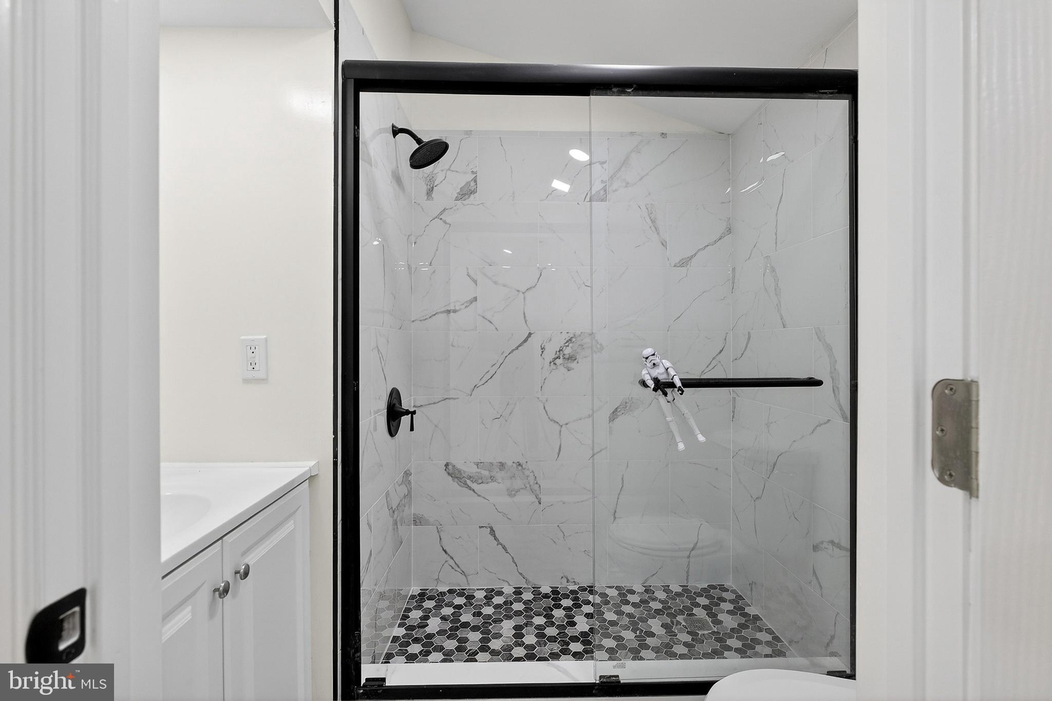 4 Lower Greenbriar Road Wilmington, DE 19810 - Photo 15 of 31 a bathroom with a shower