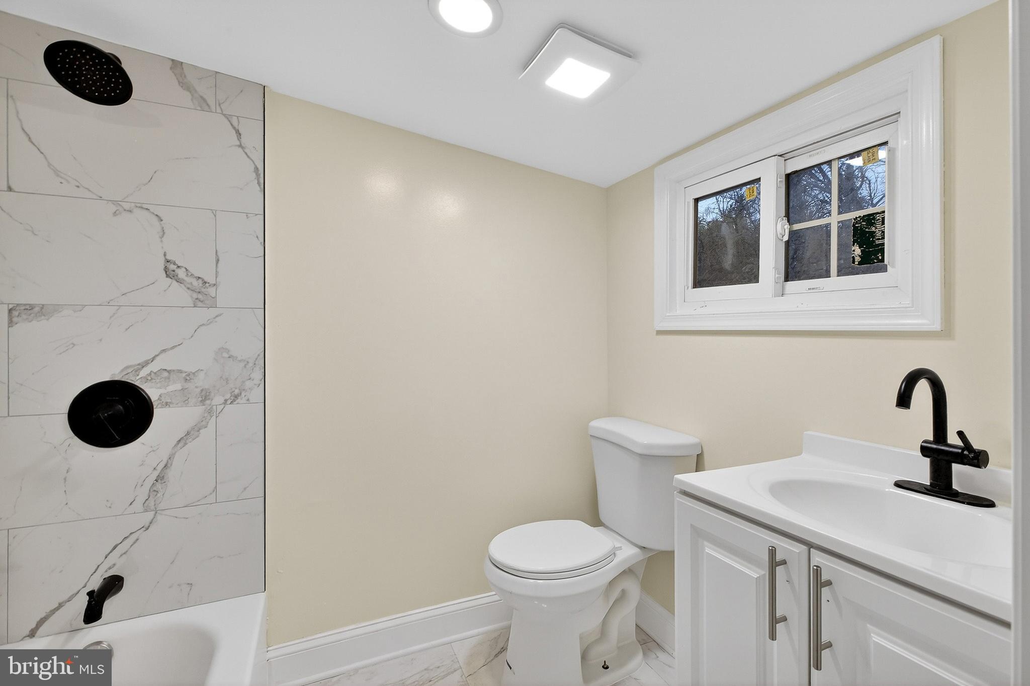 4 Lower Greenbriar Road Wilmington, DE 19810 - Photo 27 of 31 a bathroom with a sink toilet and shower