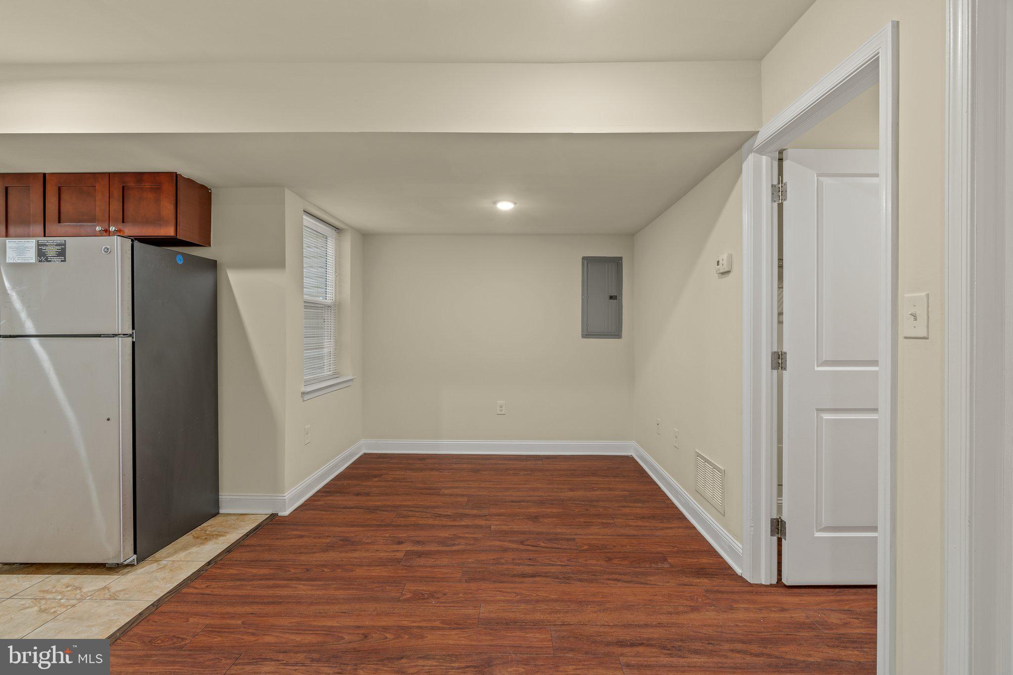 1724 Master Street, Unit C Philadelphia, PA 19121 - Photo 17 of 26 a view of a livingroom with wooden floor