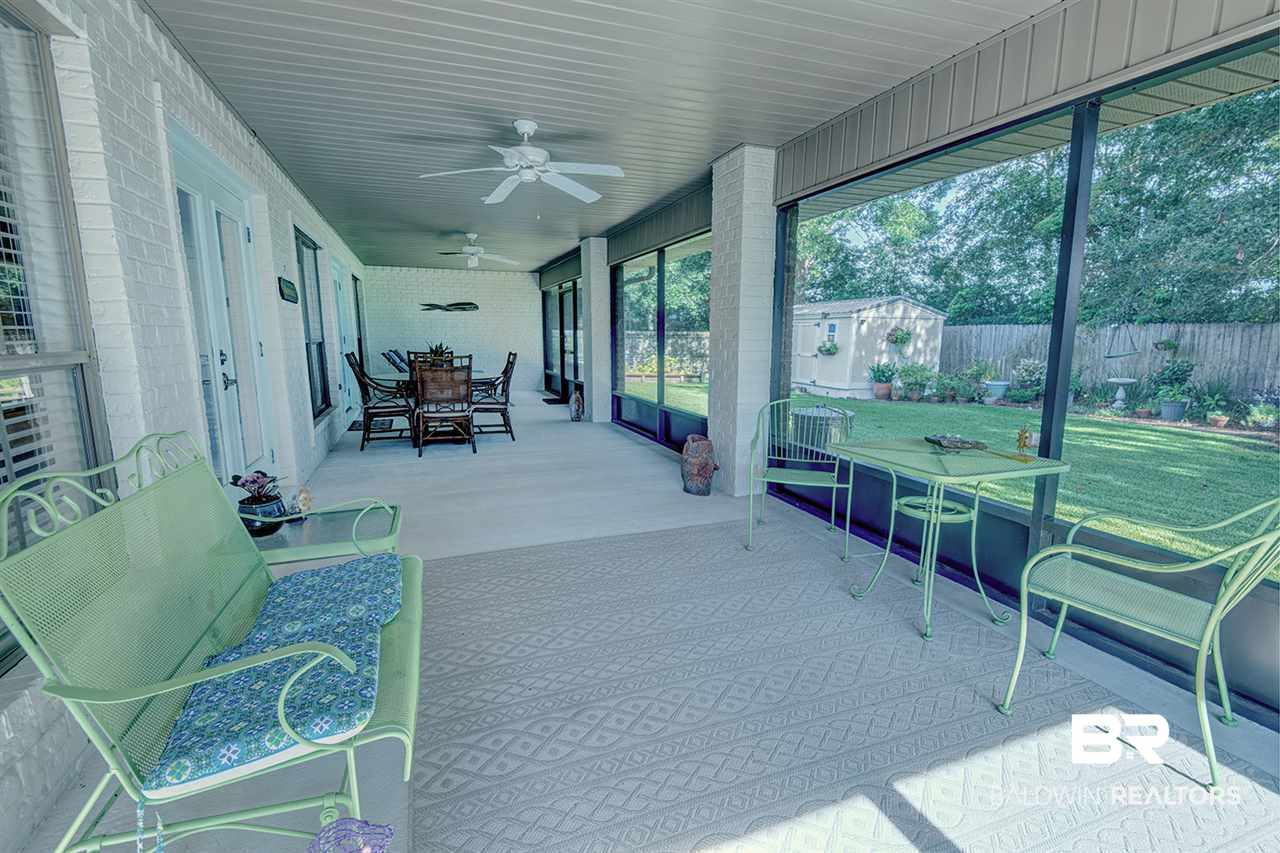 252 Meadow Run Loop West Foley, AL 36535 - Photo 18 of 48 Screened Back Porch