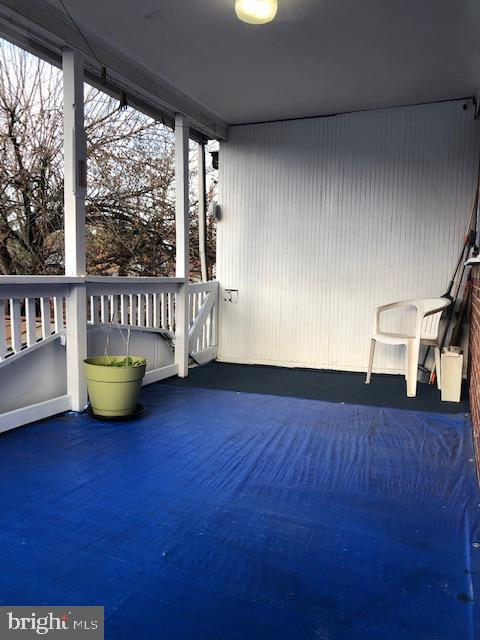 728 Bethnal Road Baltimore, MD 21229 - Photo 27 of 40 Tarp over Redwood deck keeps storage below dry!