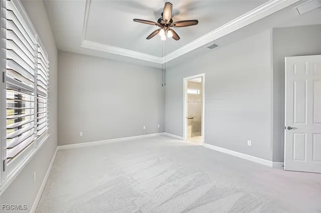 an aerial view of residential house with outdoor space and swimming pool