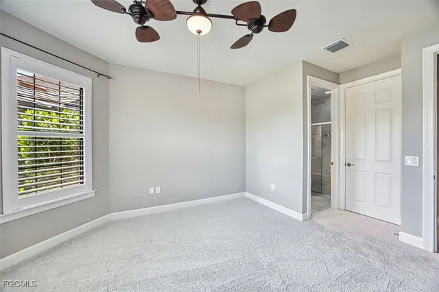 a view of a patio with furniture and a table