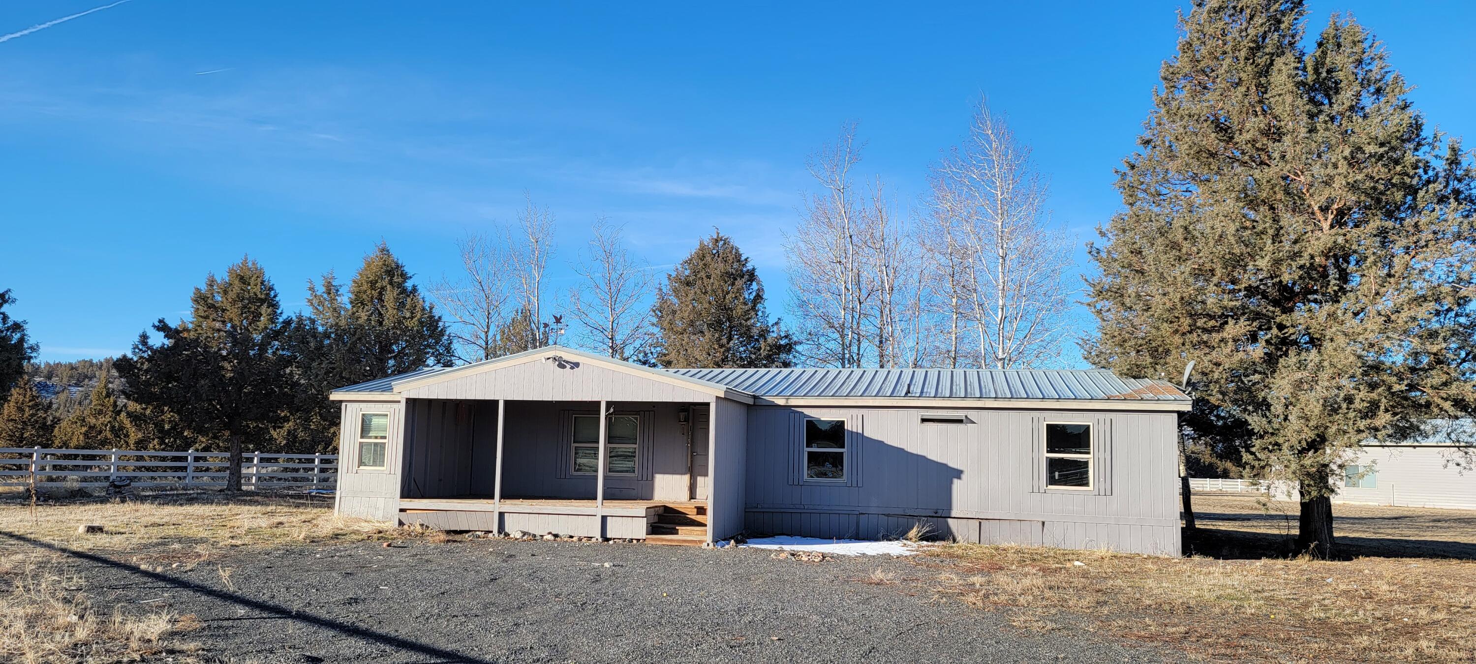 68290 George Cyrus Road Sisters, OR 97759 - Photo 34 of 52 Front of manufactured home