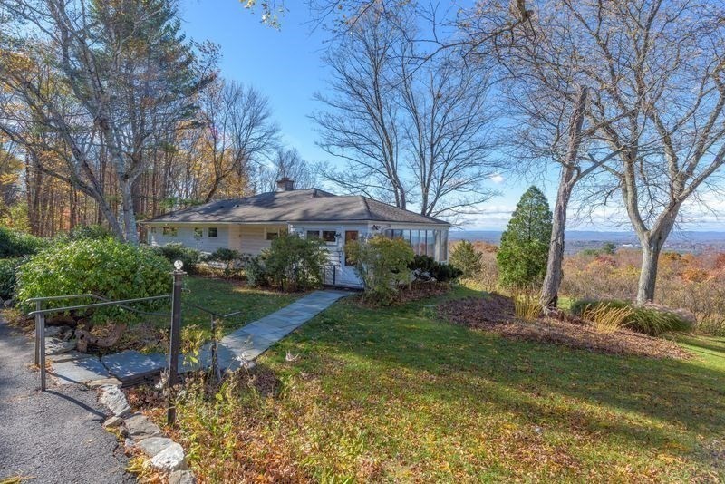 a view of backyard with green space