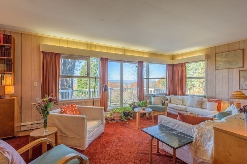 41 Arnold Road Pelham, MA 01002 - Photo 13 of 42 a living room with furniture and a large window