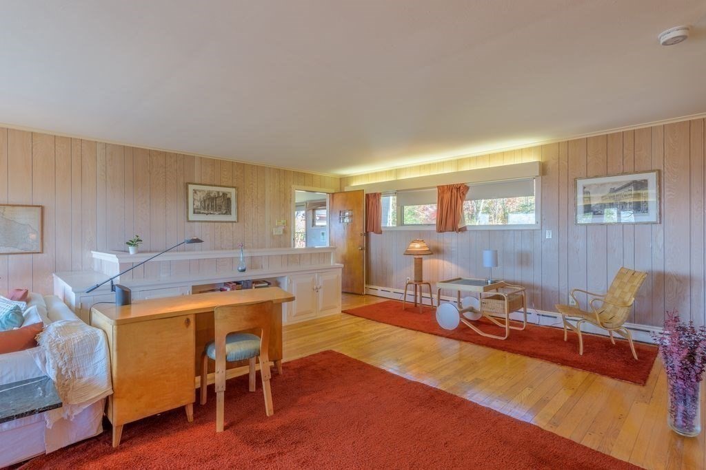 41 Arnold Road Pelham, MA 01002 - Photo 14 of 42 a living room with furniture and a table