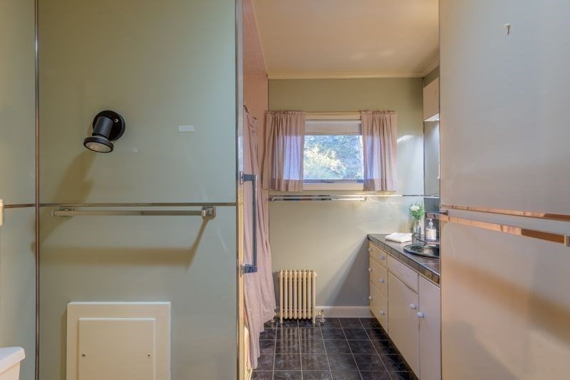 41 Arnold Road Pelham, MA 01002 - Photo 17 of 42 a bathroom with a sink a toilet and shower