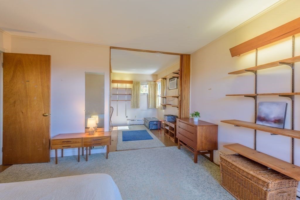 41 Arnold Road Pelham, MA 01002 - Photo 21 of 42 a living room with furniture and a window