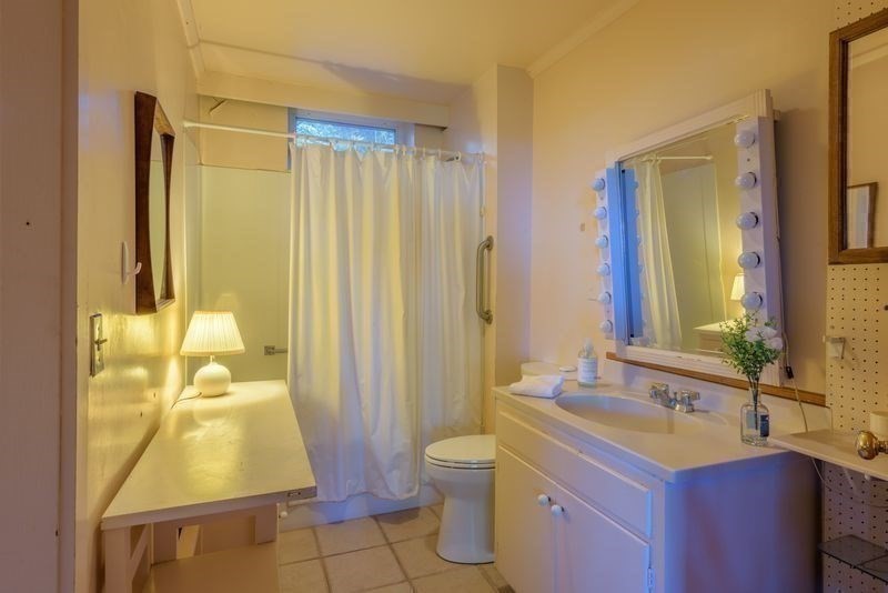 41 Arnold Road Pelham, MA 01002 - Photo 27 of 42 a bathroom with a sink and a mirror