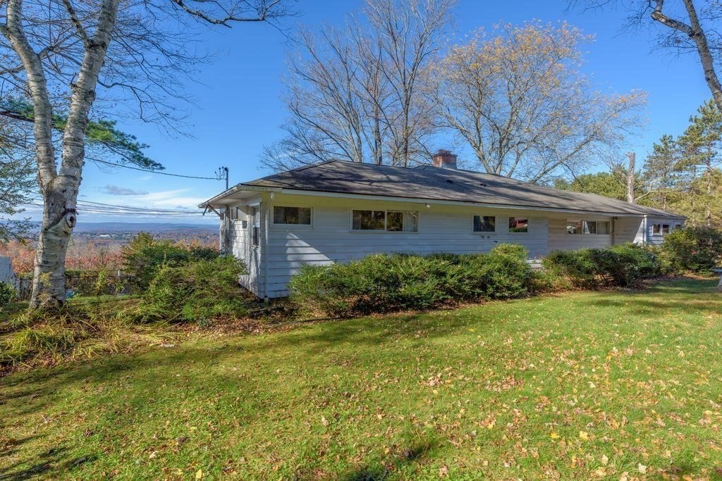 41 Arnold Road Pelham, MA 01002 - Photo 3 of 42 a view of a house with a yard