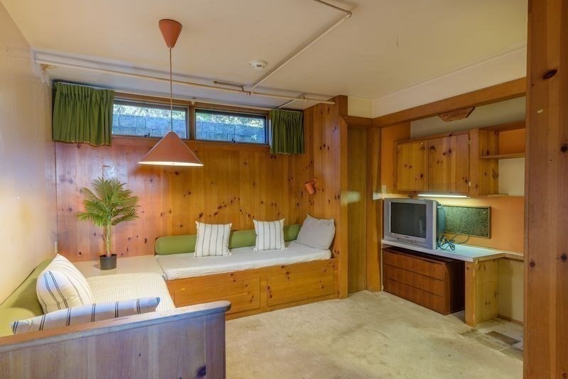 41 Arnold Road Pelham, MA 01002 - Photo 33 of 42 a living room with furniture and a flat screen tv